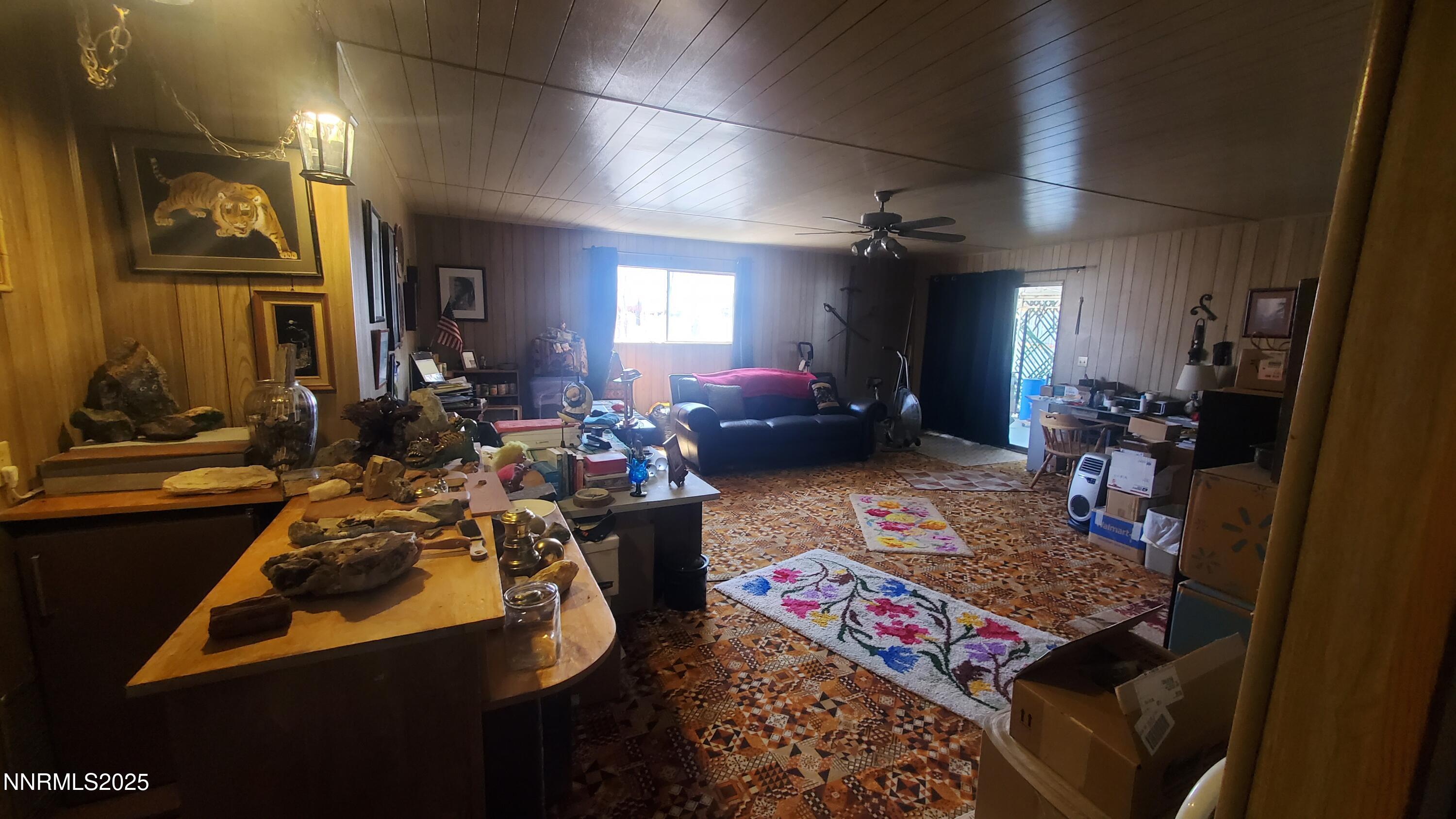 206 12th Street Mina, NV 89422 - Photo 4 of 7 a living room with furniture rug and window