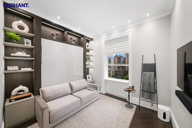 a bathroom with a sink double vanity mirror and a bathtub