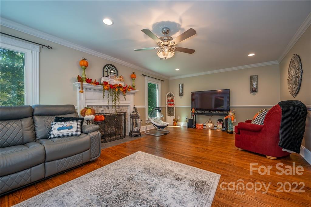 106 Gray Court Rutherfordton, NC 28139 - Photo 16 of 46 a living room with furniture and a flat screen tv