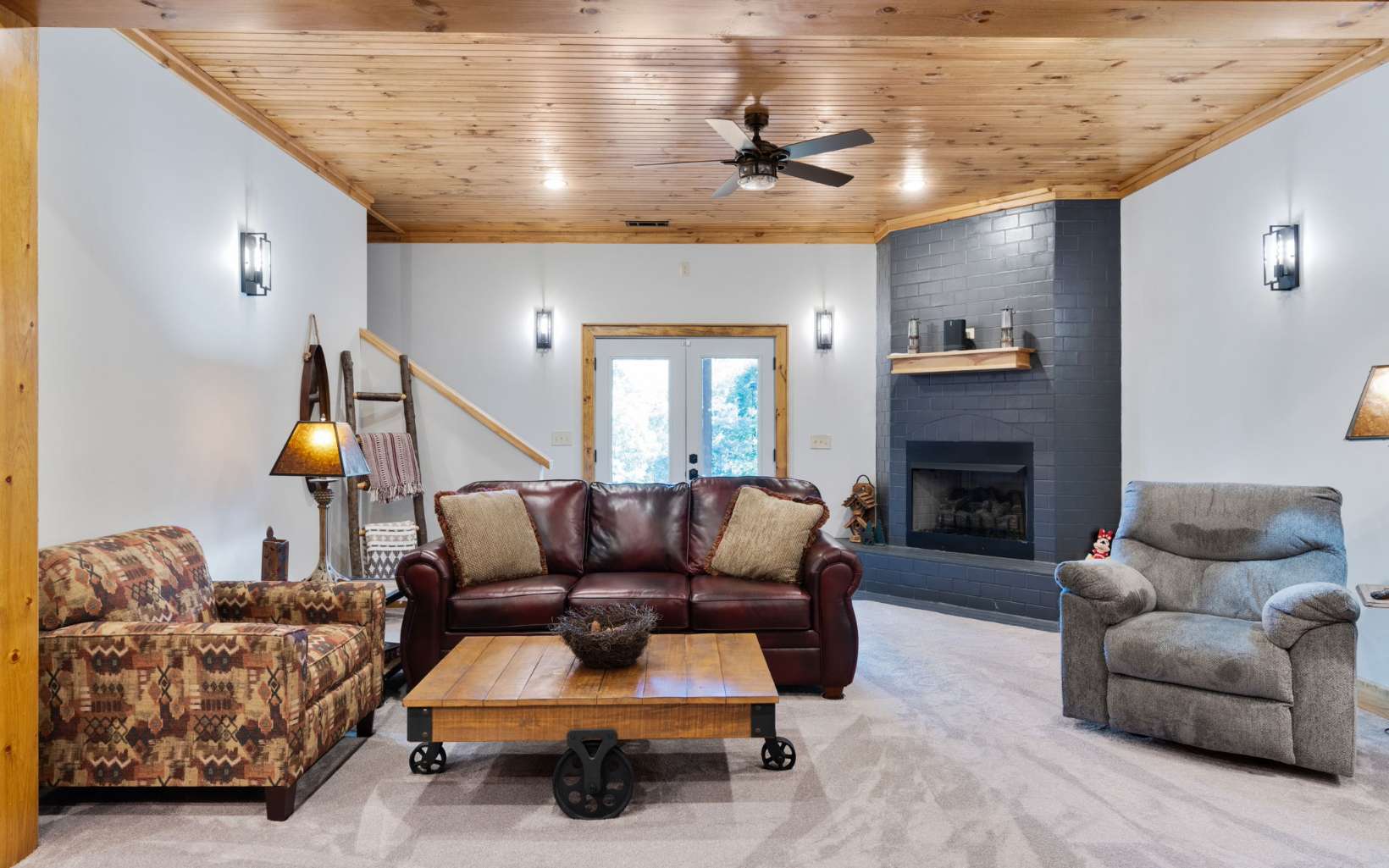 42 Overlook Road Blue Ridge, GA 30513 - Photo 20 of 63 a living room with furniture and a fireplace