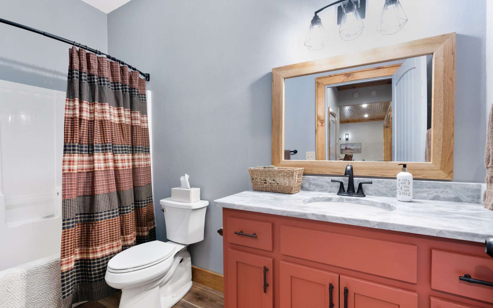 42 Overlook Road Blue Ridge, GA 30513 - Photo 34 of 63 a bathroom with a granite countertop toilet sink and mirror