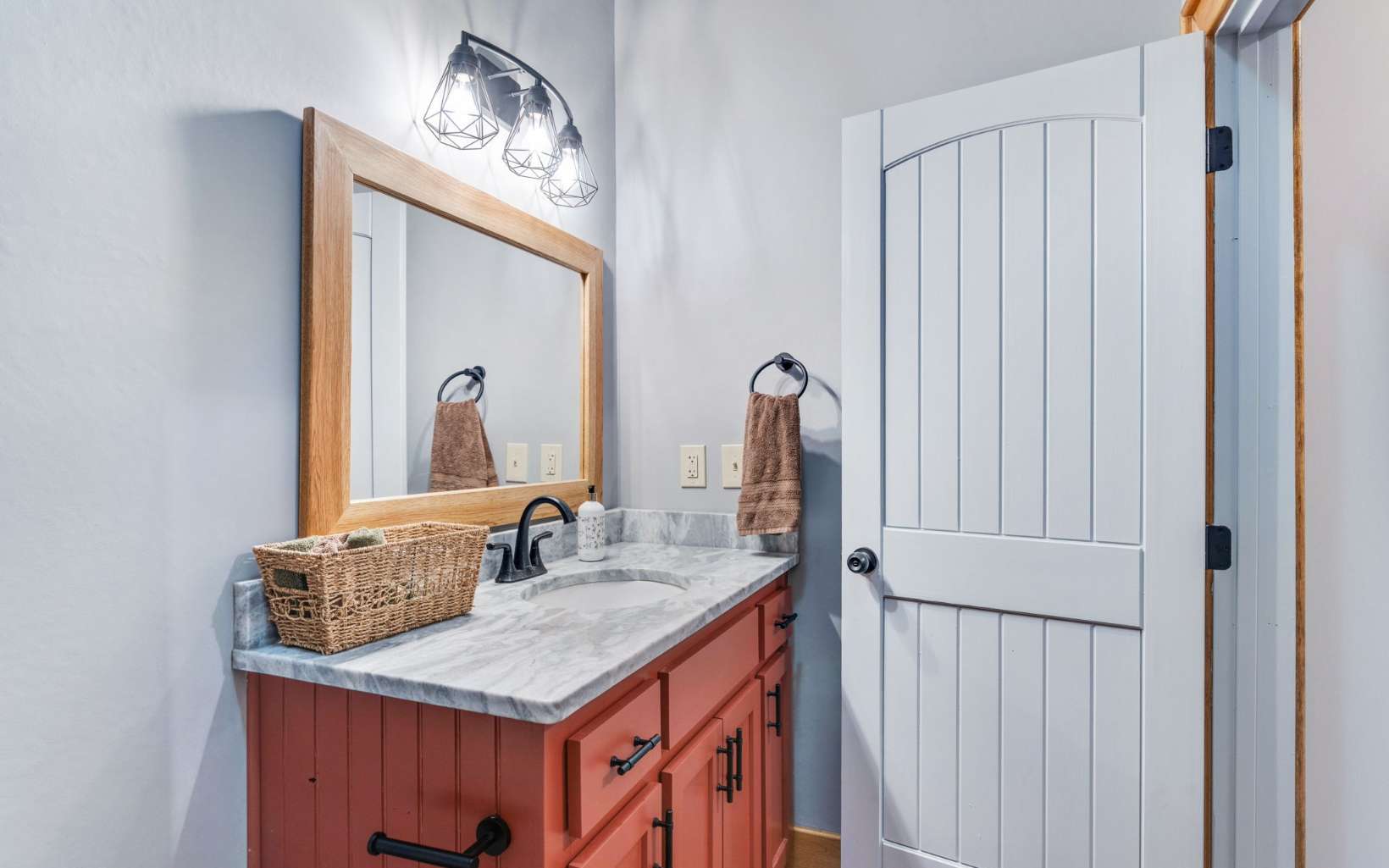 42 Overlook Road Blue Ridge, GA 30513 - Photo 35 of 63 a bathroom with a sink vanity and a mirror