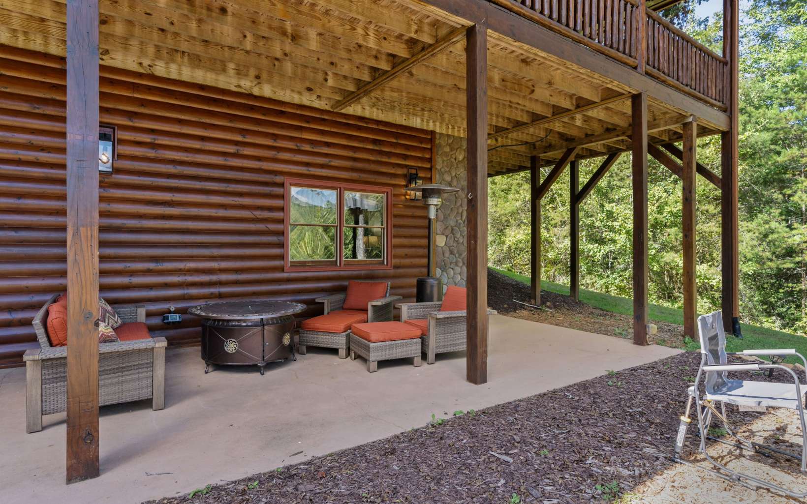 42 Overlook Road Blue Ridge, GA 30513 - Photo 61 of 63 a backyard of a house with outdoor seating