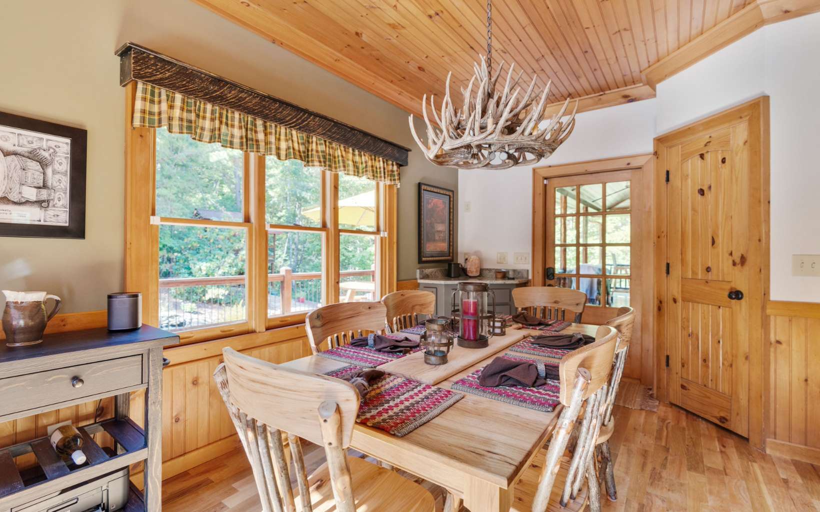 42 Overlook Road Blue Ridge, GA 30513 - Photo 10 of 63 a view of a dining room with furniture a chandelier and wooden floor