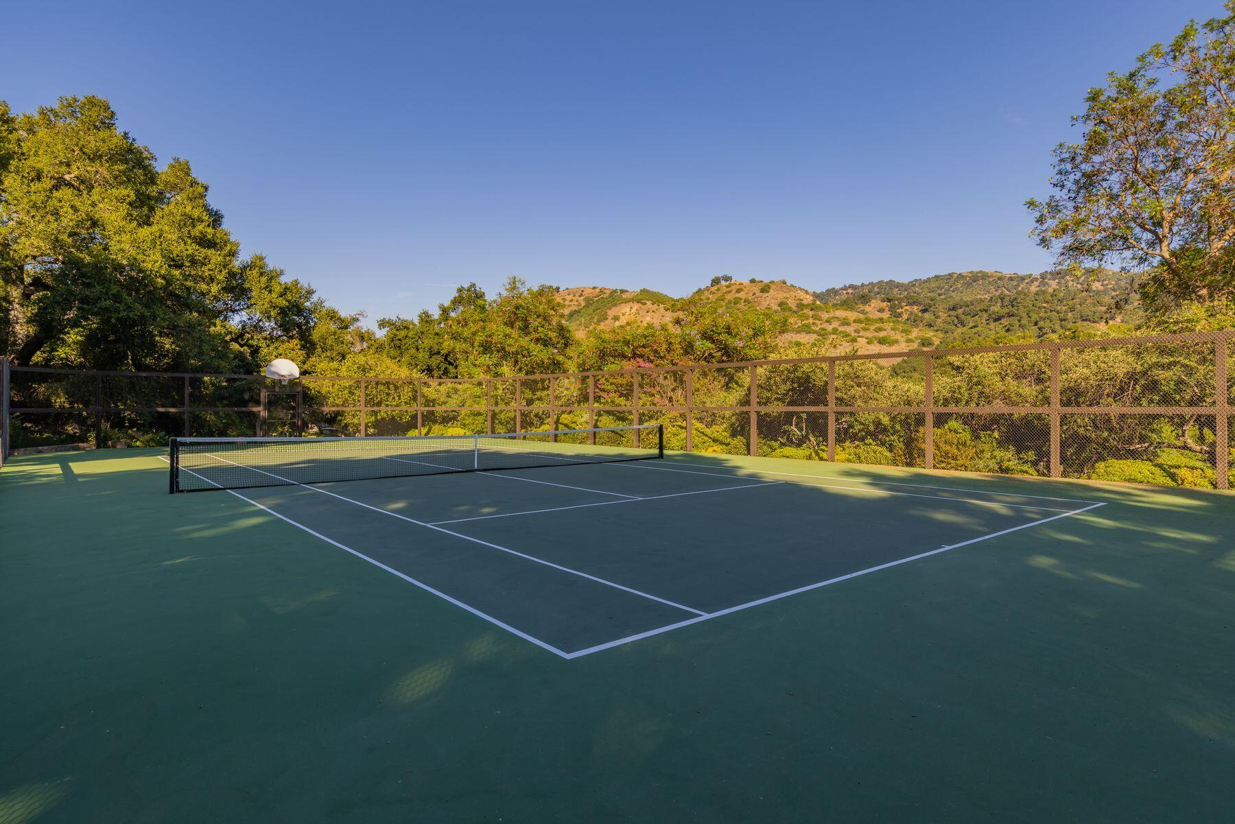 10883 Oak Knoll Road Ojai, CA 93023 - Photo 17 of 43 a view of an outdoor space and tennis court