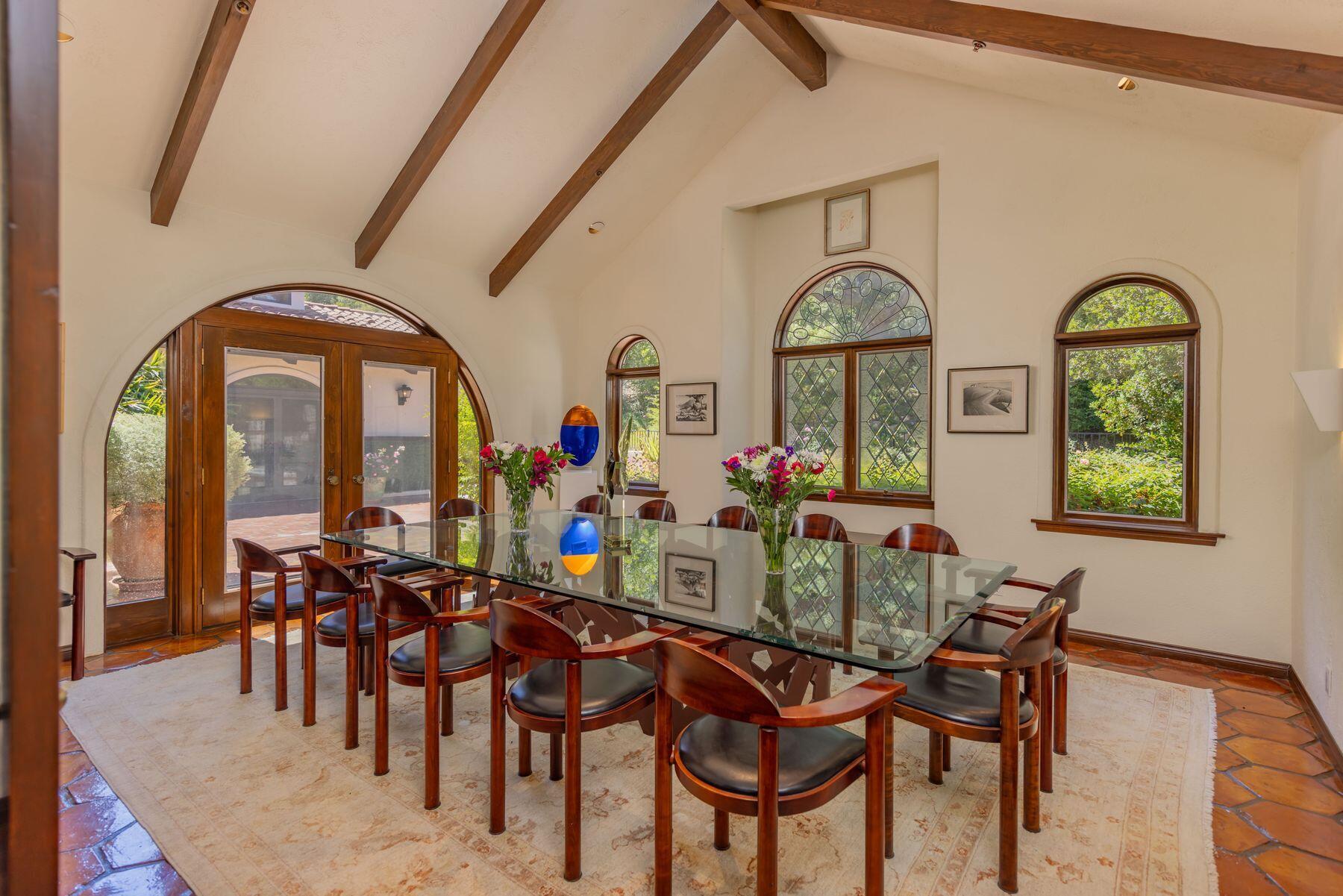 10883 Oak Knoll Road Ojai, CA 93023 - Photo 26 of 43 a view of a dining room with furniture and chandelier
