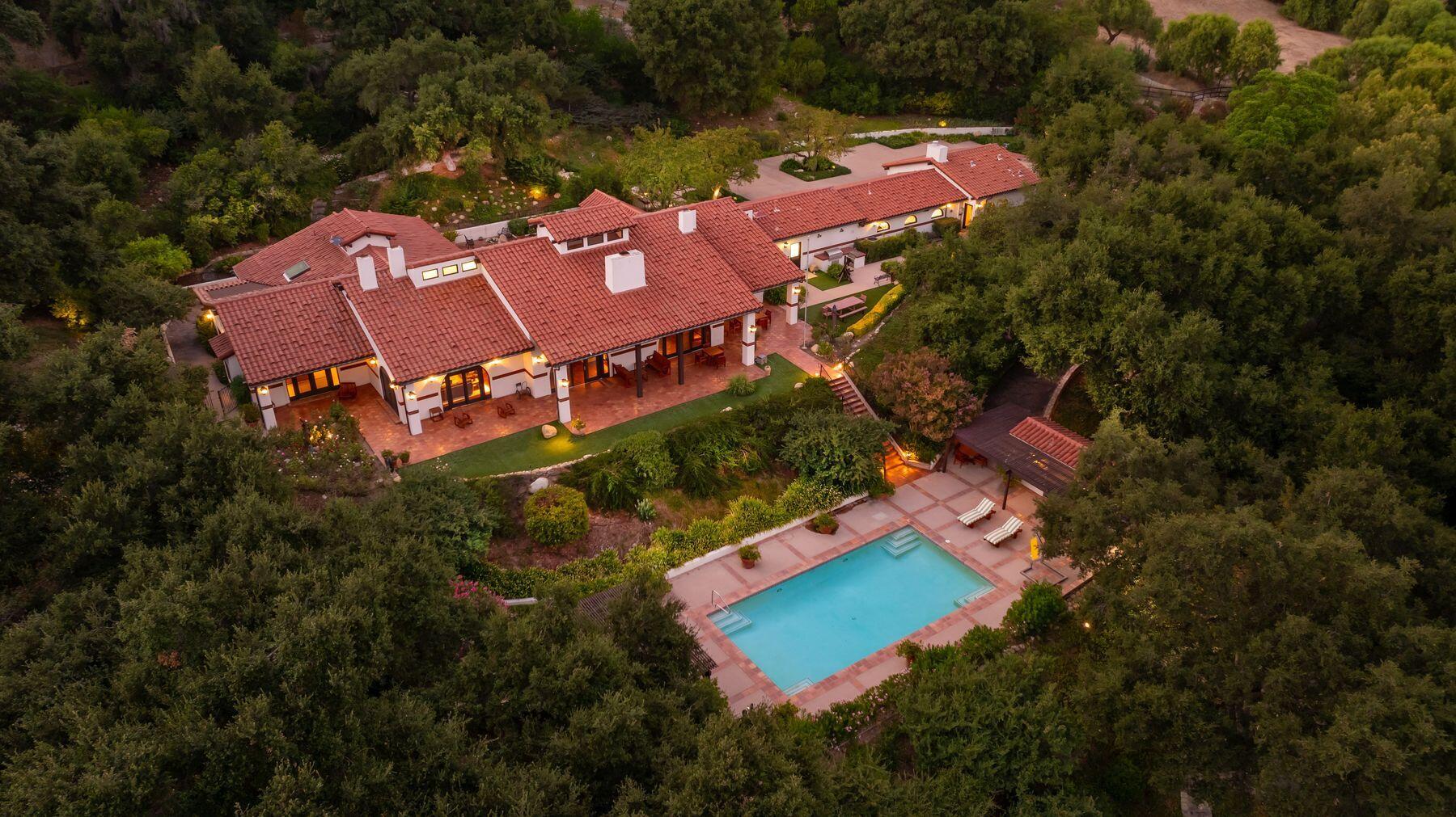 10883 Oak Knoll Road Ojai, CA 93023 - Photo 9 of 43 an aerial view of a house with a garden and swimming pool
