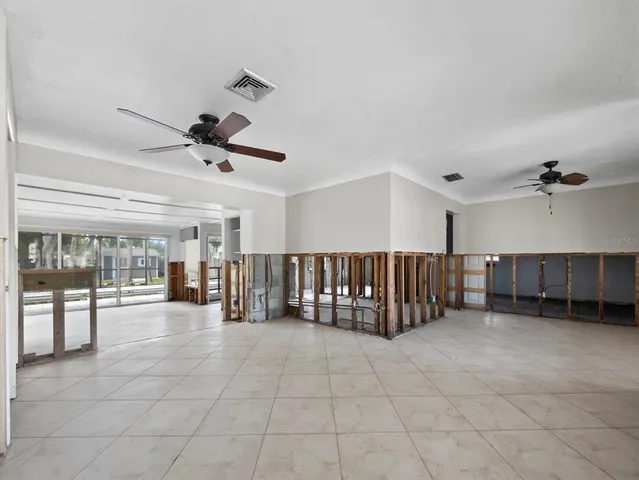 a large white room with kitchen