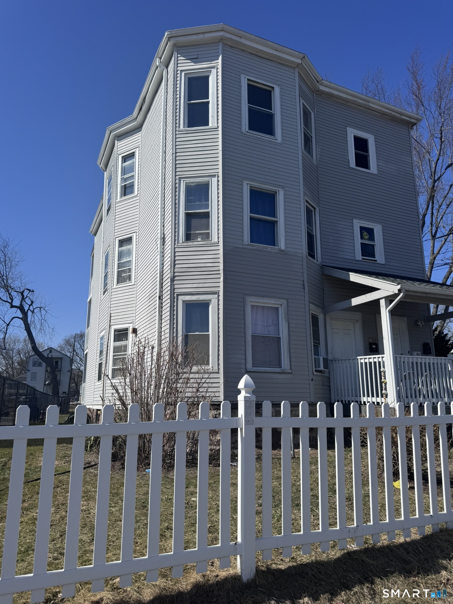 283 Martin Street Hartford, CT 06120 - Photo 2 of 16 a front view of a house with glass windows