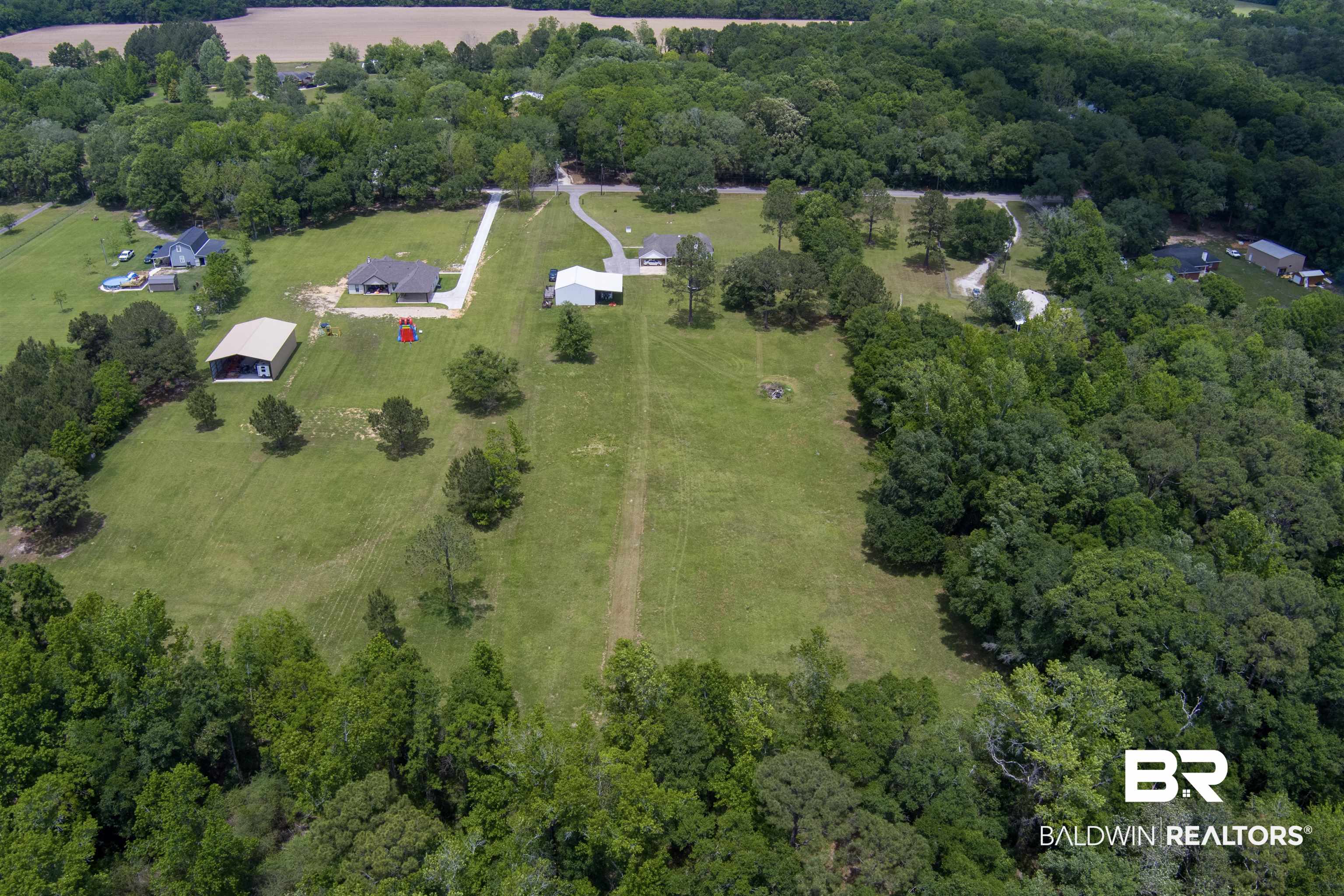 13925 Fort Lake Road Grand Bay, AL 36541 - Photo 30 of 37 Birds eye view of property featuring a rural view and a forest view