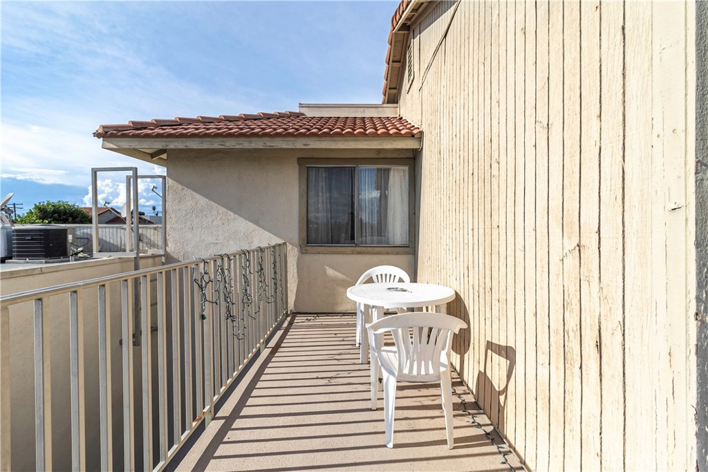 874 Cinnamon Lane, Unit 62 Duarte, CA 91010 - Photo 11 of 22 a front view of a house with wooden fence