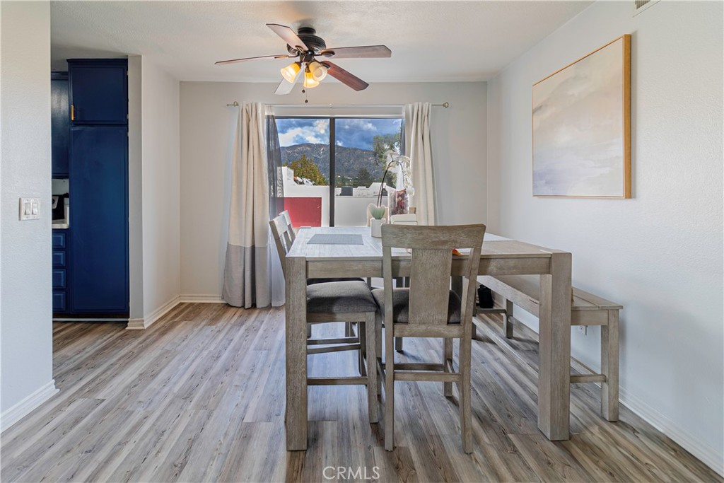 874 Cinnamon Lane, Unit 62 Duarte, CA 91010 - Photo 14 of 22 a view of a dining room with furniture and wooden floor