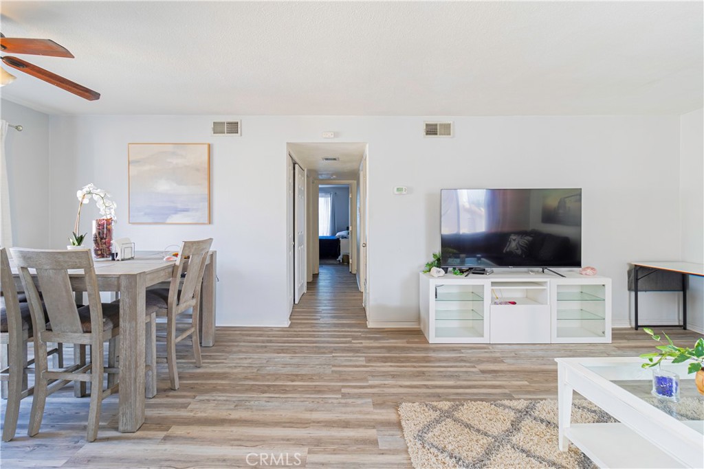 874 Cinnamon Lane, Unit 62 Duarte, CA 91010 - Photo 16 of 22 a view of a livingroom with furniture and a flat screen tv