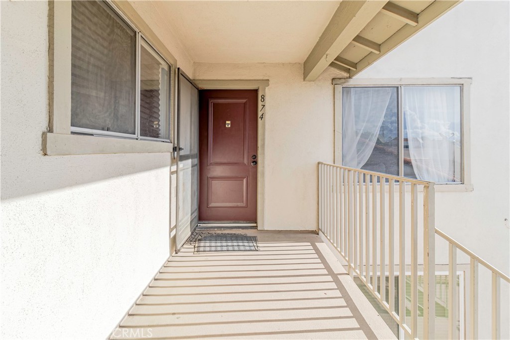874 Cinnamon Lane, Unit 62 Duarte, CA 91010 - Photo 17 of 22 a view of a hallway with wooden floor and staircase