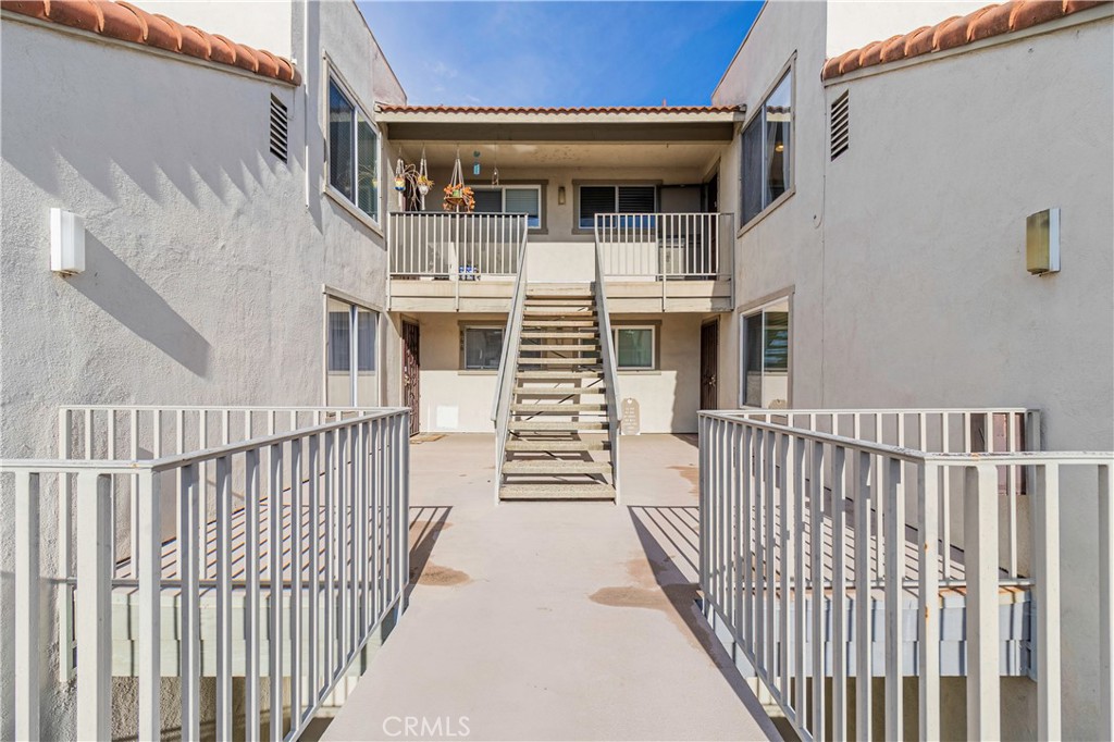 874 Cinnamon Lane, Unit 62 Duarte, CA 91010 - Photo 19 of 22 a view of a house with wooden stairs