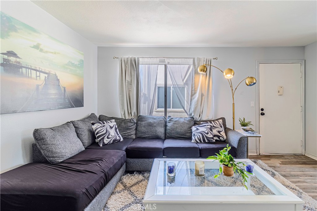 874 Cinnamon Lane, Unit 62 Duarte, CA 91010 - Photo 2 of 22 a living room with furniture and a couch