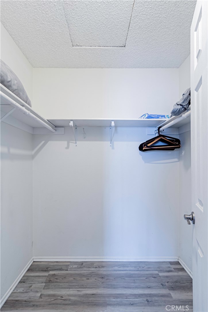 874 Cinnamon Lane, Unit 62 Duarte, CA 91010 - Photo 10 of 22 a view of a room with racks on the wall