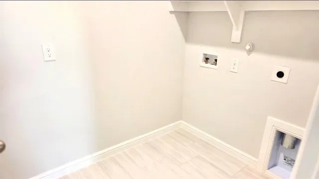 a bathroom with a toilet and a bathtub