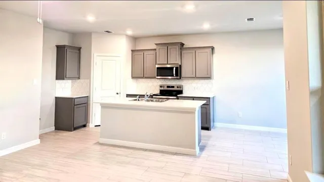 a view of kitchen and window