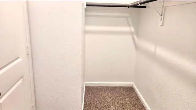 a bathroom with a sink vanity and a mirror