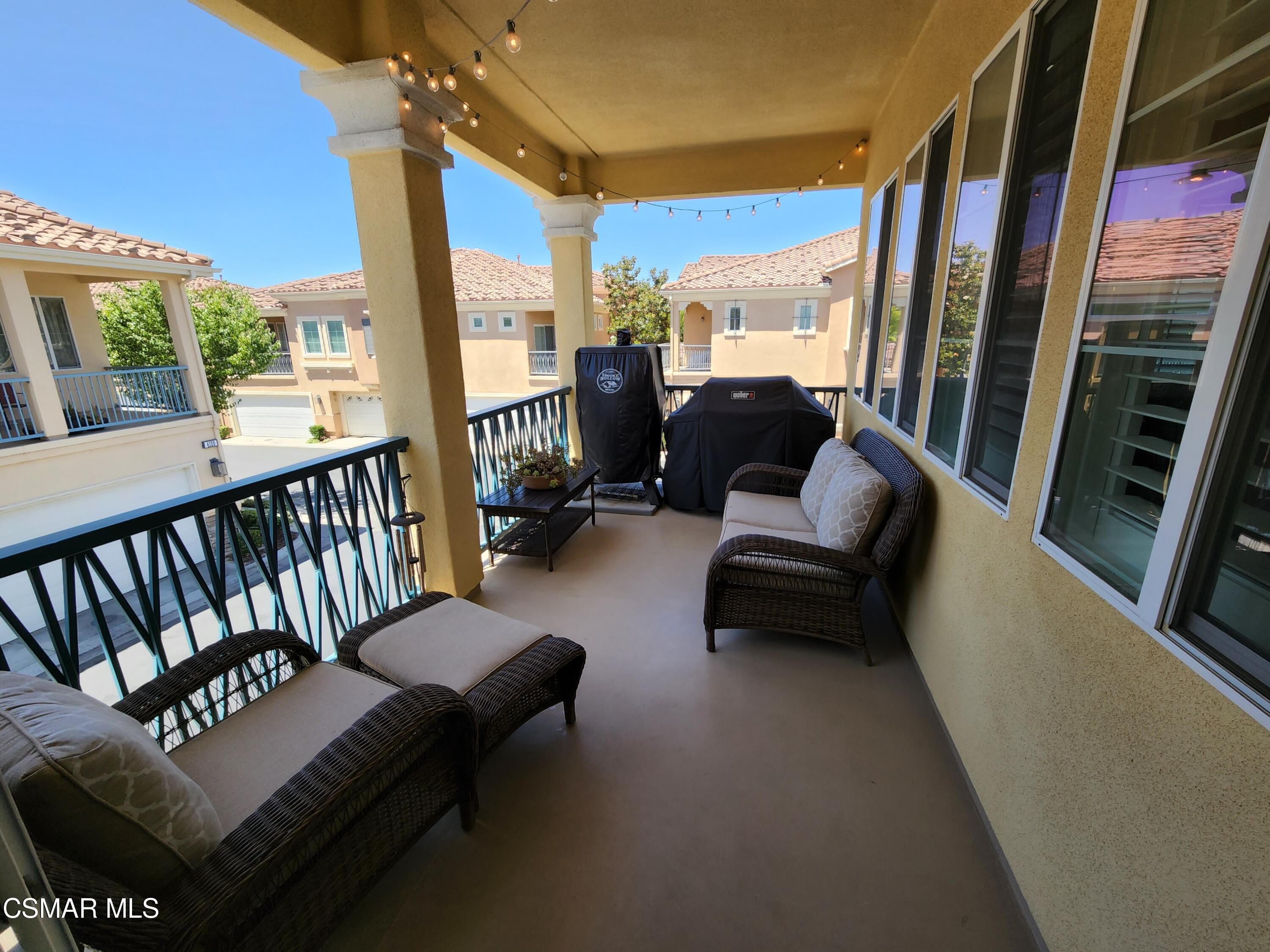 4121 Paredo Way, Unit D Simi Valley, CA 93063 - Photo 16 of 35 a living room with furniture and a large window