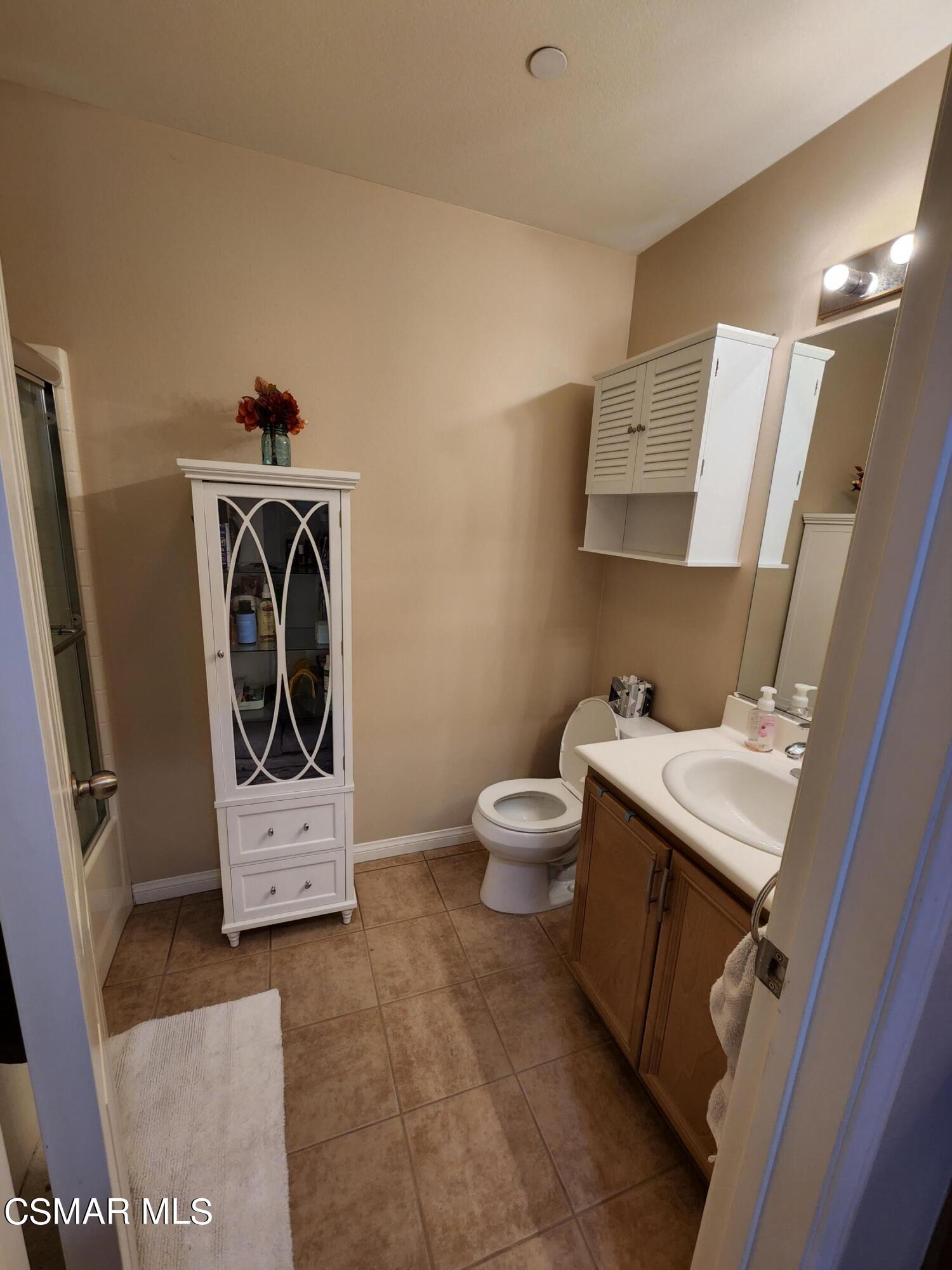 4121 Paredo Way, Unit D Simi Valley, CA 93063 - Photo 20 of 35 a utility room with dryer and washer