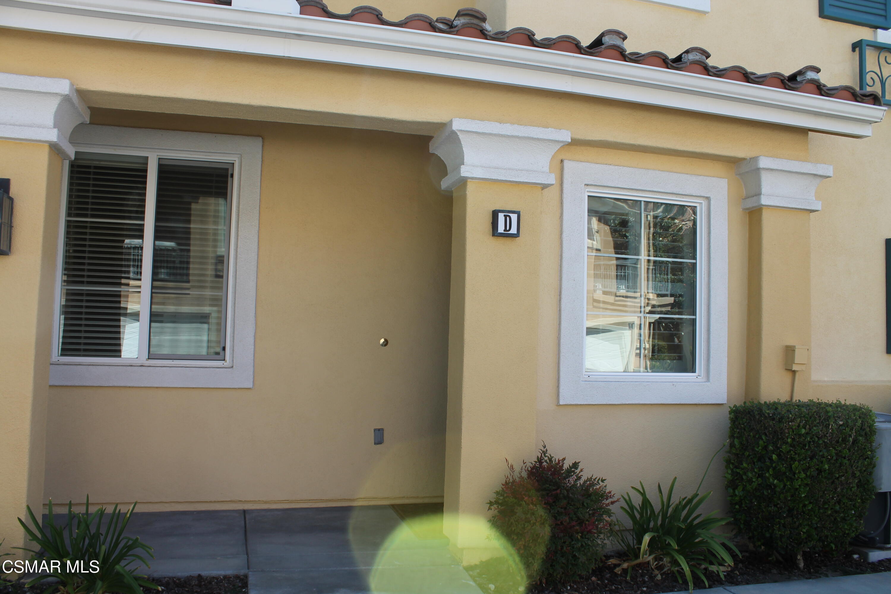 4121 Paredo Way, Unit D Simi Valley, CA 93063 - Photo 3 of 35 a view of a house with a backyard