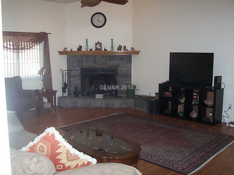 5840 Doubletree Road Pahrump, NV 89061 - Photo 3 of 24 Property Photo. LIVING ROOM WITH FIREPLACE