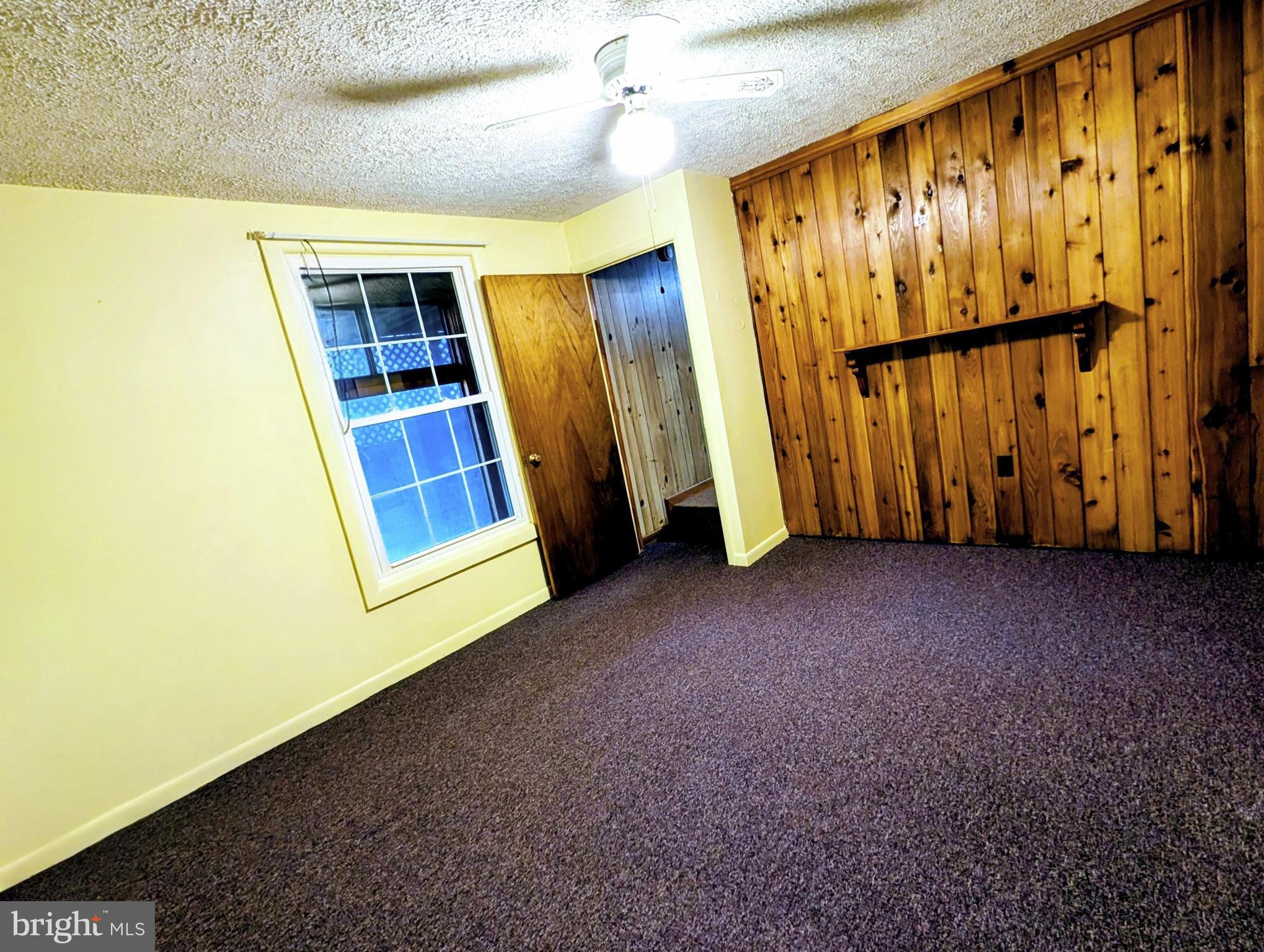 7403 Bear Branch Road Adamstown, MD 21710 - Photo 22 of 43 a view of an empty room with a window