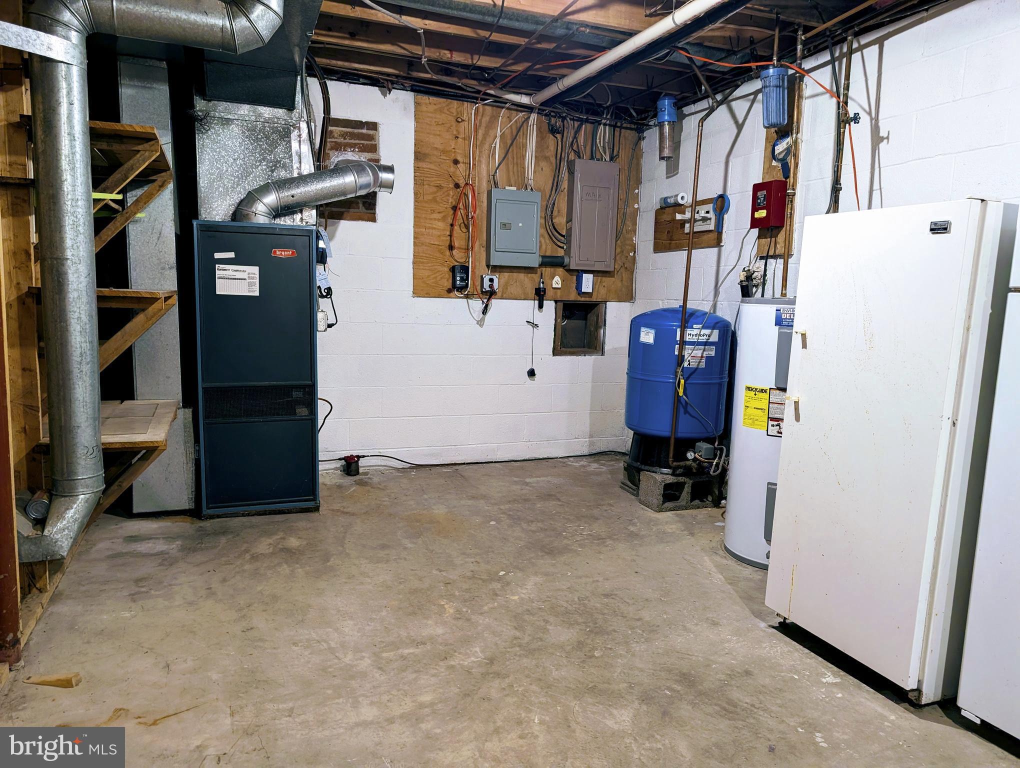 7403 Bear Branch Road Adamstown, MD 21710 - Photo 26 of 43 a view of walk in closet with clothes and shoes
