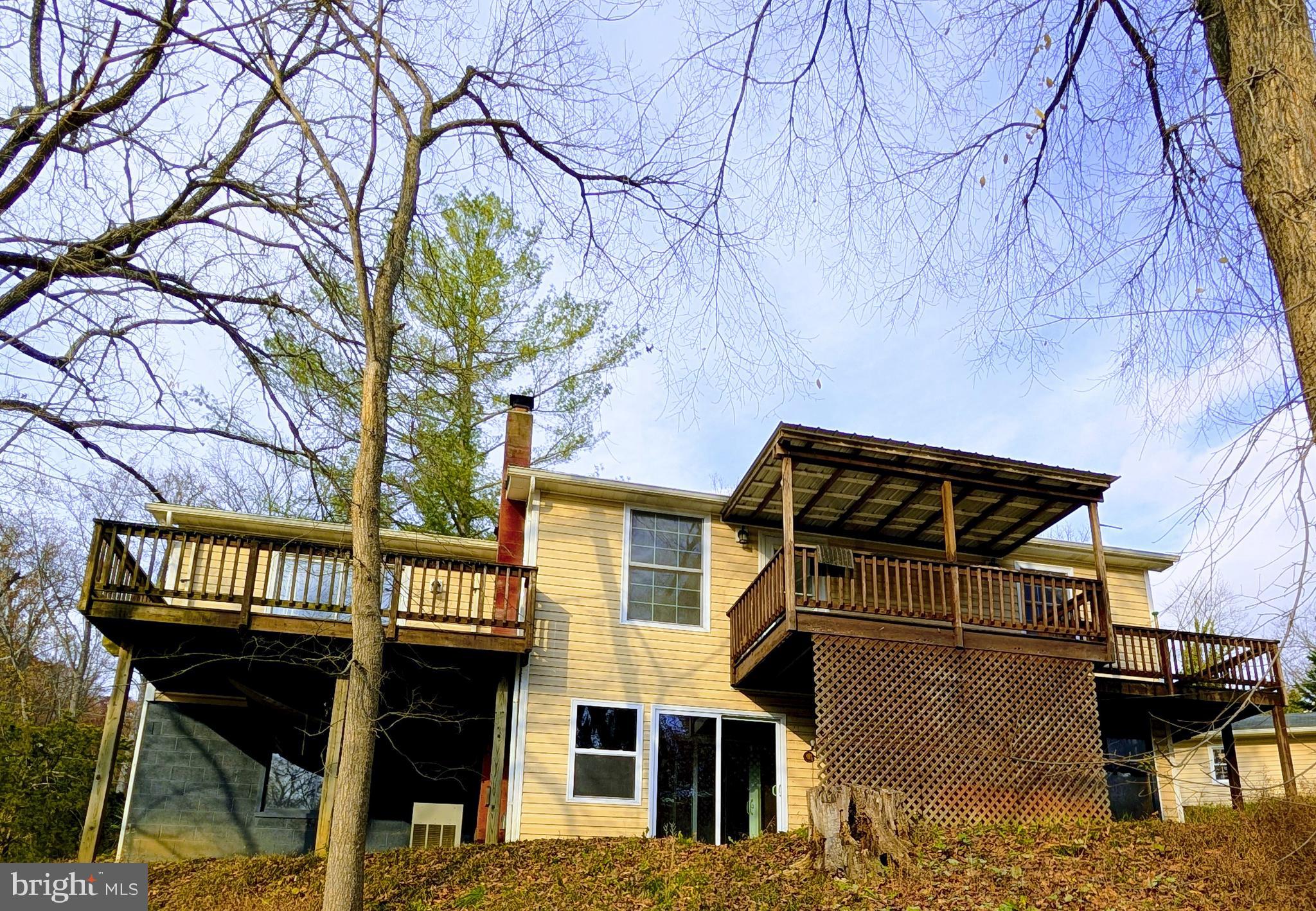 7403 Bear Branch Road Adamstown, MD 21710 - Photo 35 of 43 a front view of a building with entryway