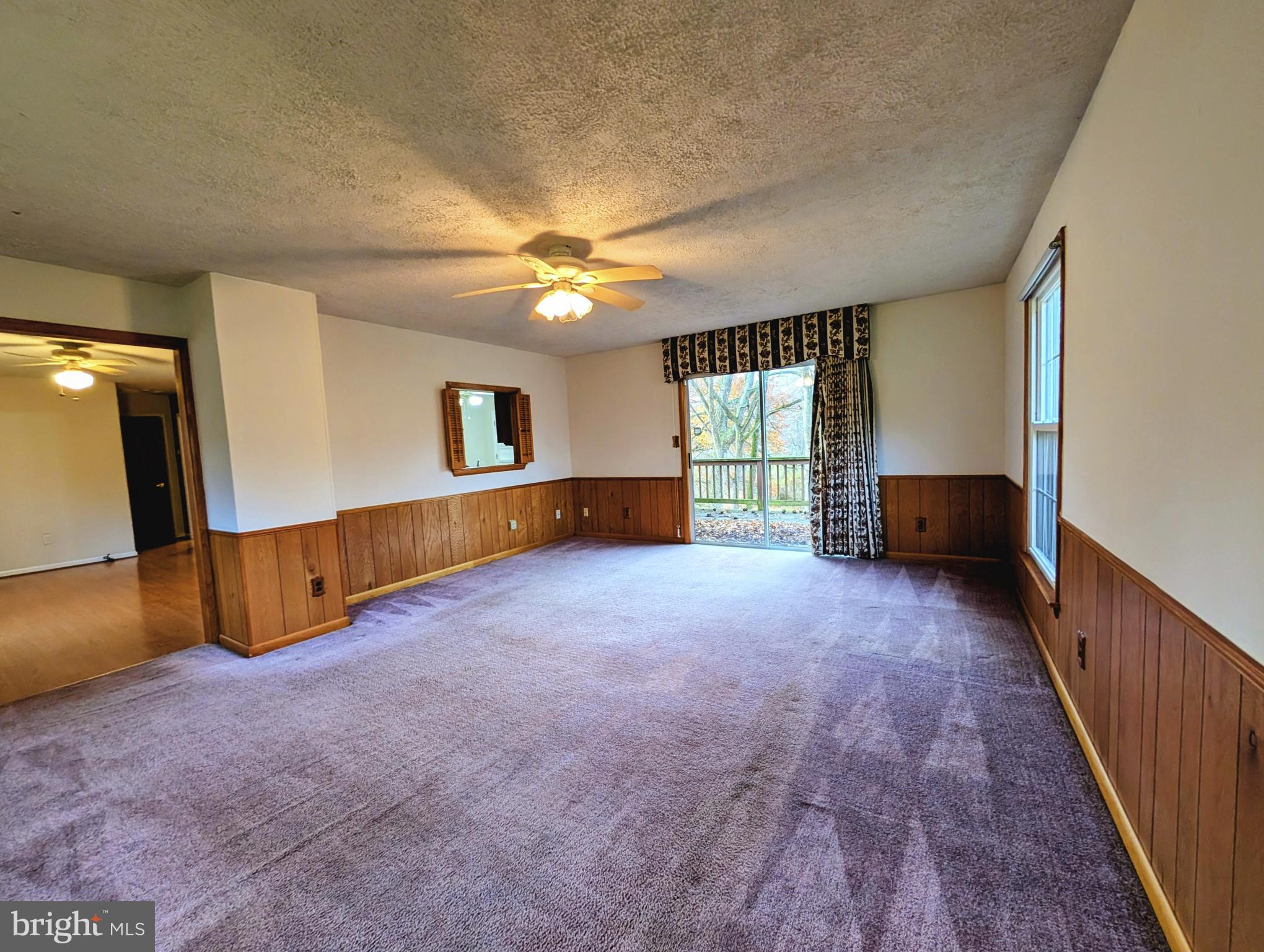 7403 Bear Branch Road Adamstown, MD 21710 - Photo 9 of 43 a view of a livingroom with a staircase