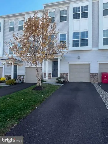 a front view of house with yard