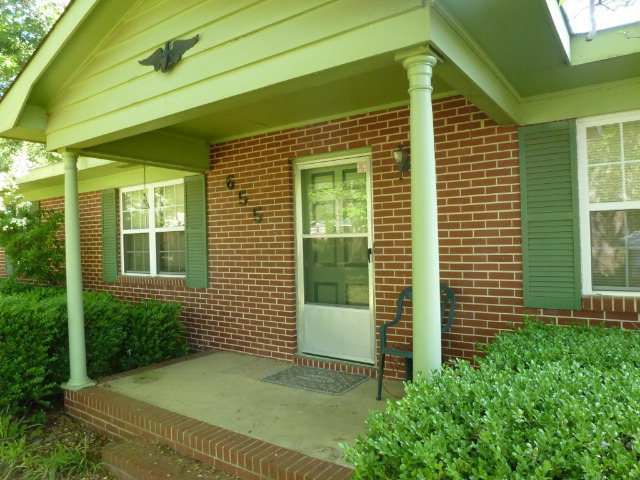 6552 Vinson Road Macon, GA 31216 - Photo 3 of 20 a view of a house with potted plants