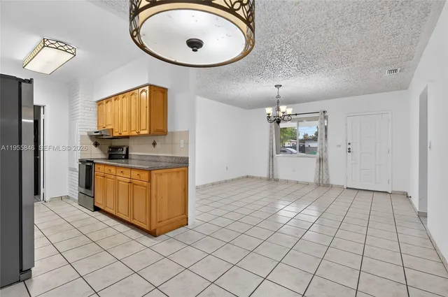 $630,000 | 5700 Northwest 111th Terrace, Hialeah, FL 33012