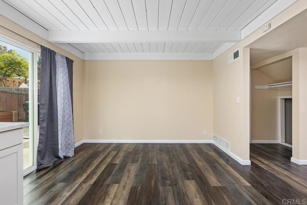 921 Lemon Avenue Vista, CA 92084 - Photo 16 of 32 wooden floor in an empty room with a window