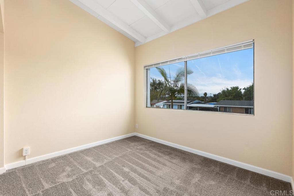 921 Lemon Avenue Vista, CA 92084 - Photo 17 of 32 a view of an empty room with a window