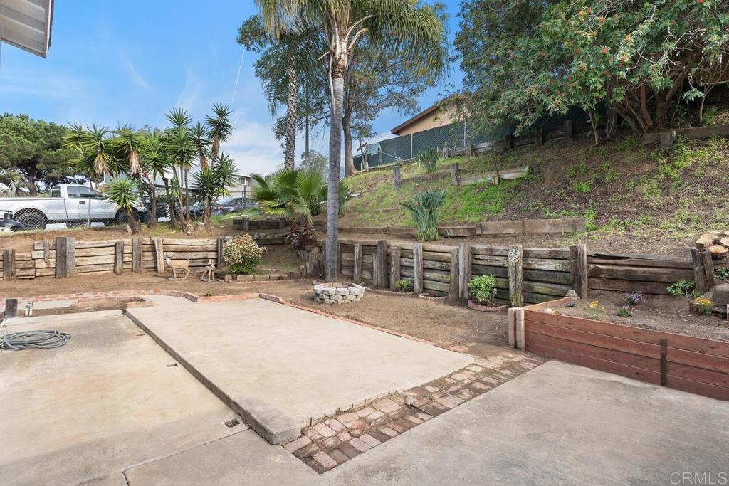 921 Lemon Avenue Vista, CA 92084 - Photo 23 of 32 a view of a backyard patio and swimming pool