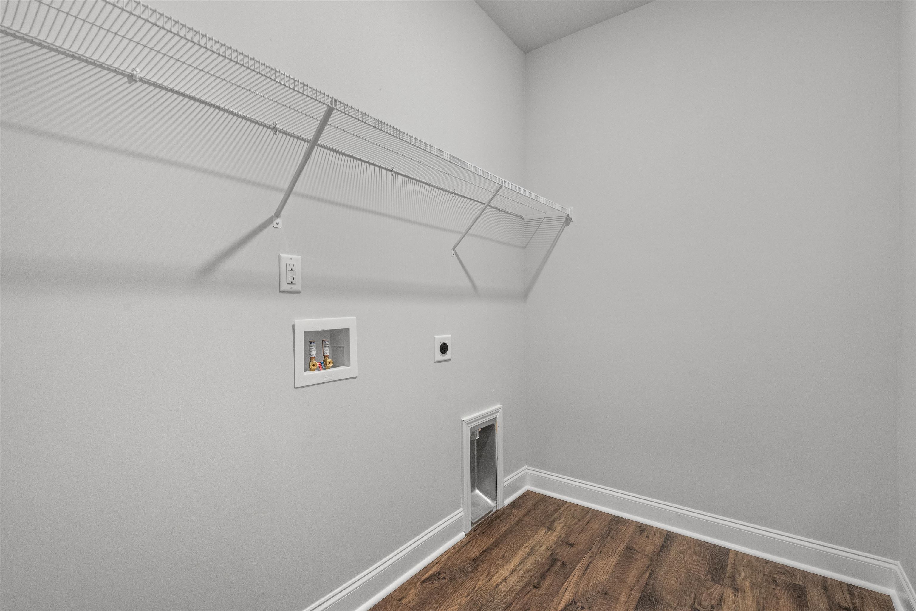 2495 Campton Loop Conway, SC 29527 - Photo 12 of 27 Washroom with dark wood-style floors, hookup for a washing machine, and electric dryer hookup