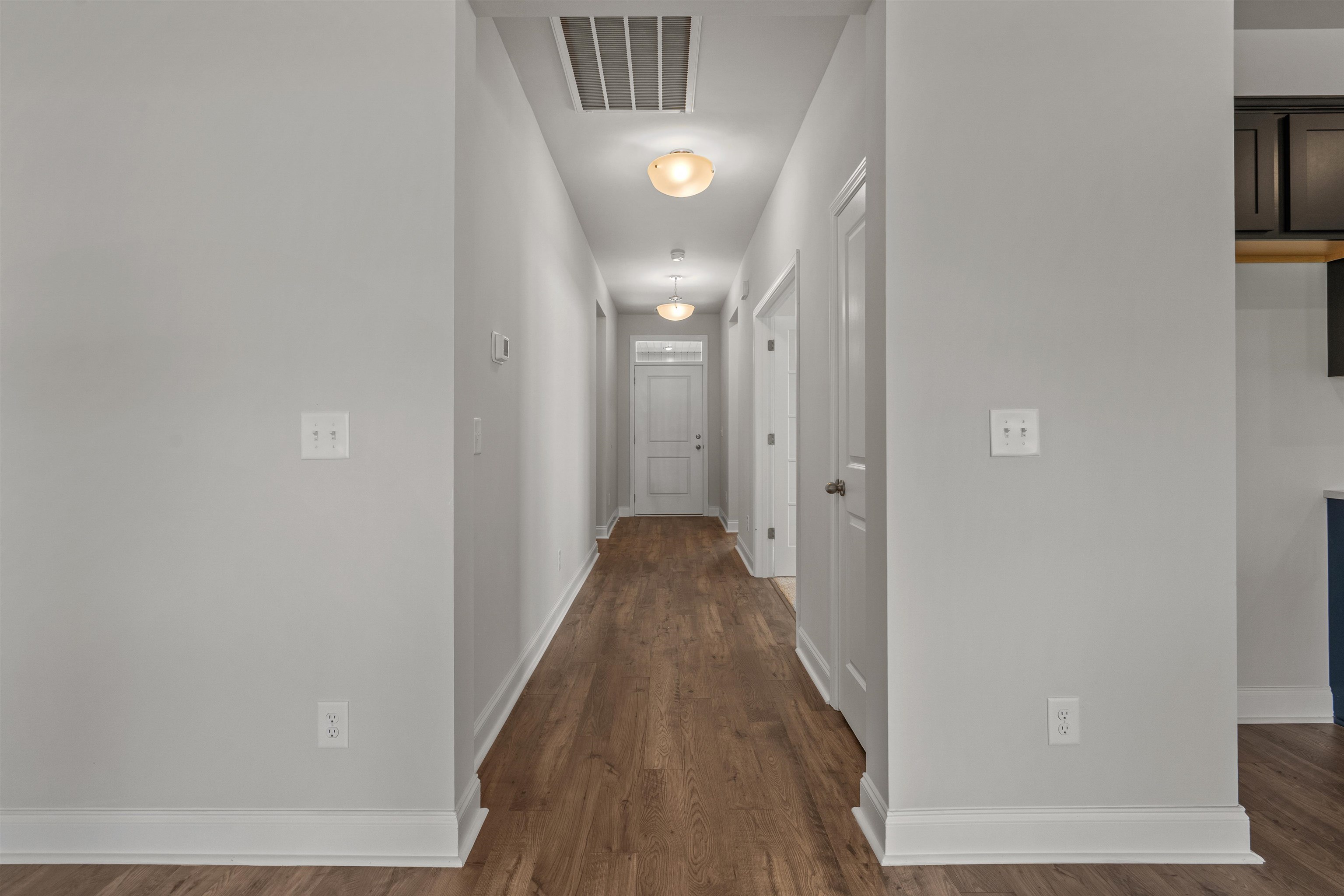 2495 Campton Loop Conway, SC 29527 - Photo 20 of 27 Corridor with baseboards and dark wood-style flooring