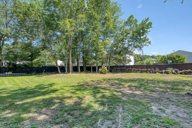 a view of a backyard with a garden