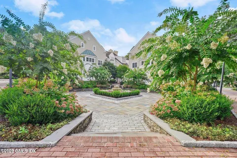 a view of a garden with pathway