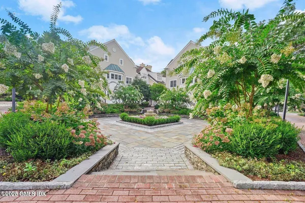 a view of a garden with pathway