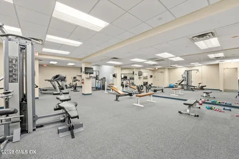 a view of a street with sitting area