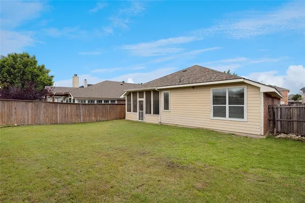 a house view with a garden space
