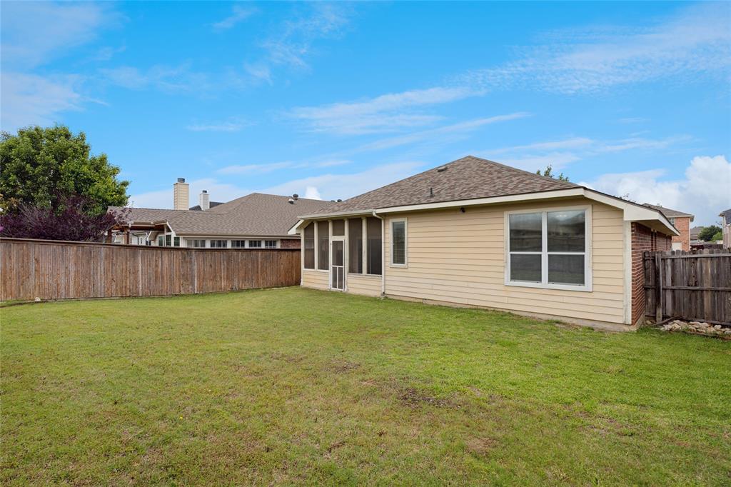 9308 Comanche Ridge Drive Fort Worth, TX 76131 - Photo 15 of 15 a house view with a garden space