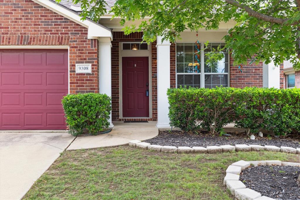 9308 Comanche Ridge Drive Fort Worth, TX 76131 - Photo 2 of 15 a view of a entryway front of house