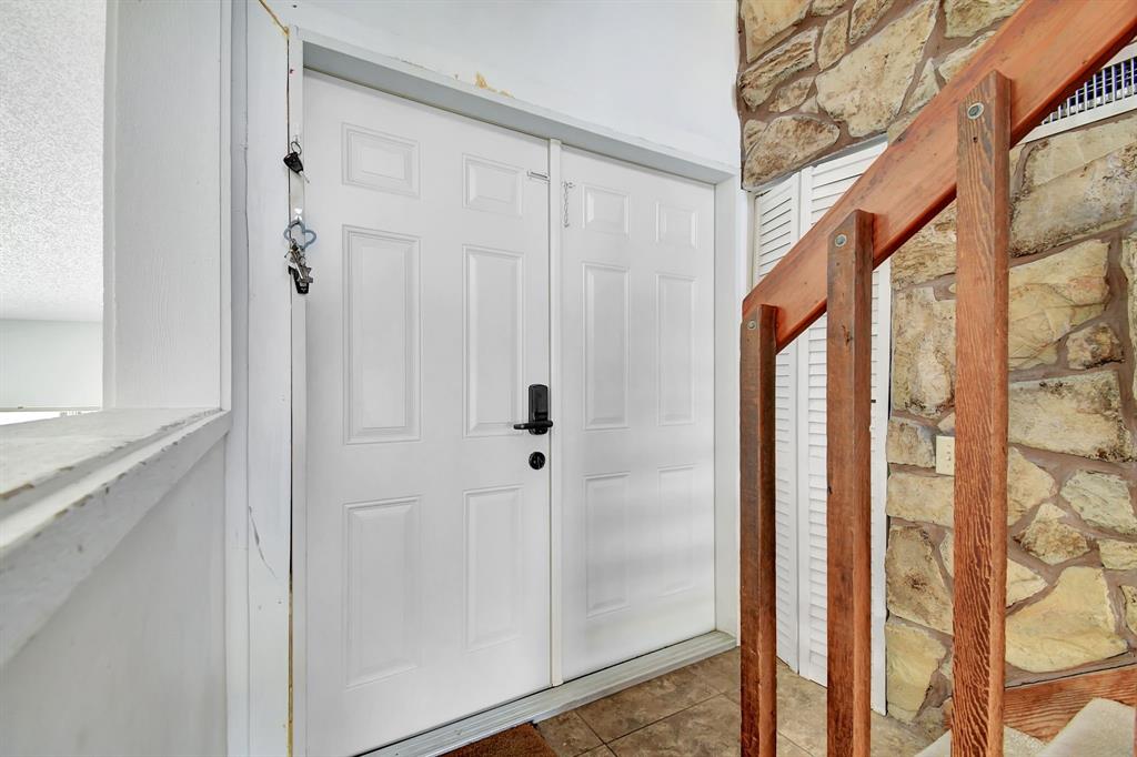 2420 Southwest 80th Terrace Miramar, FL 33025 - Photo 3 of 30 a view of a bathroom with a shower curtain