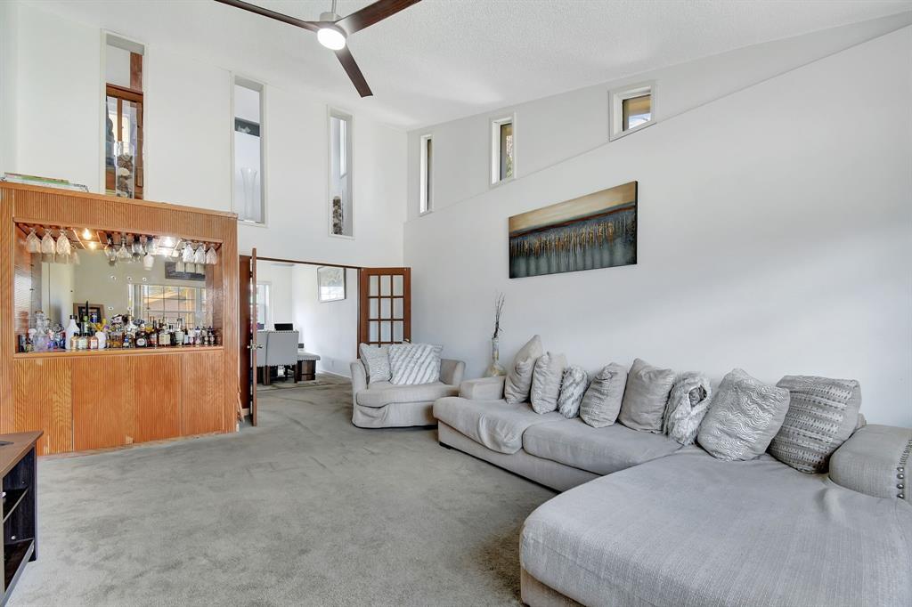 2420 Southwest 80th Terrace Miramar, FL 33025 - Photo 5 of 30 a living room with furniture and a floor to ceiling window