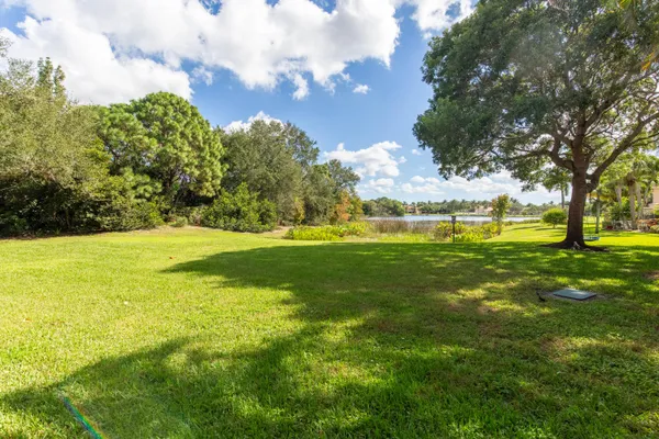 a view of a golf course with a lake